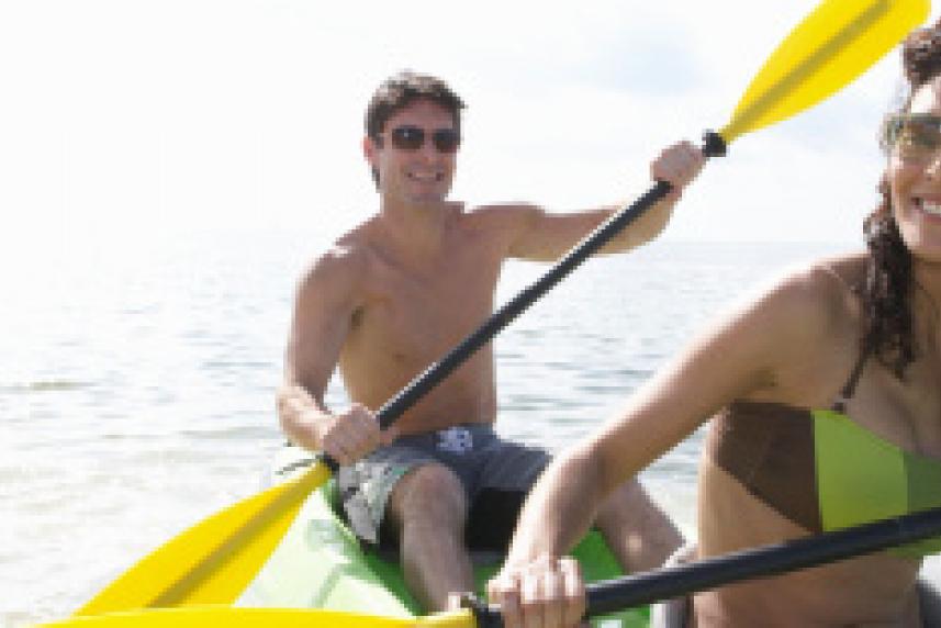 Photo: Man and woman kayaking
