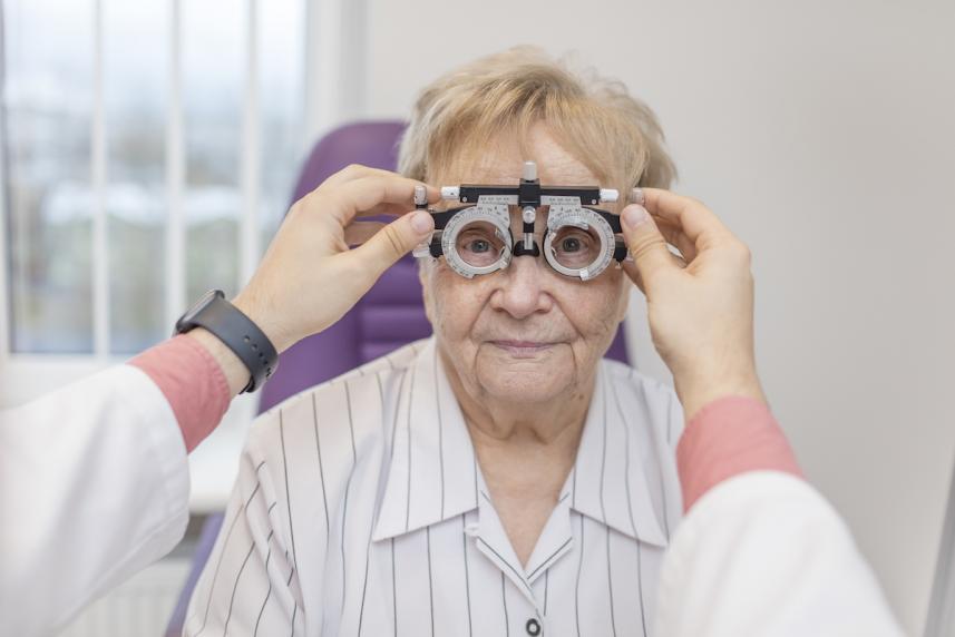 older woman getting eye exam