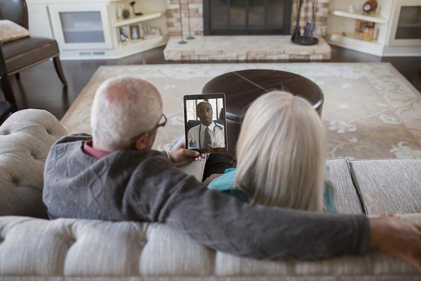 older couple face timing with doctor