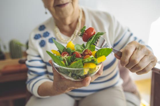 Woman eating a salad