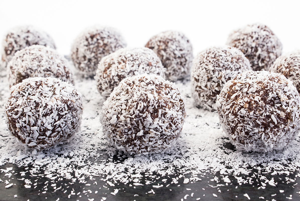 Chocolate balls covered with coconut flakes