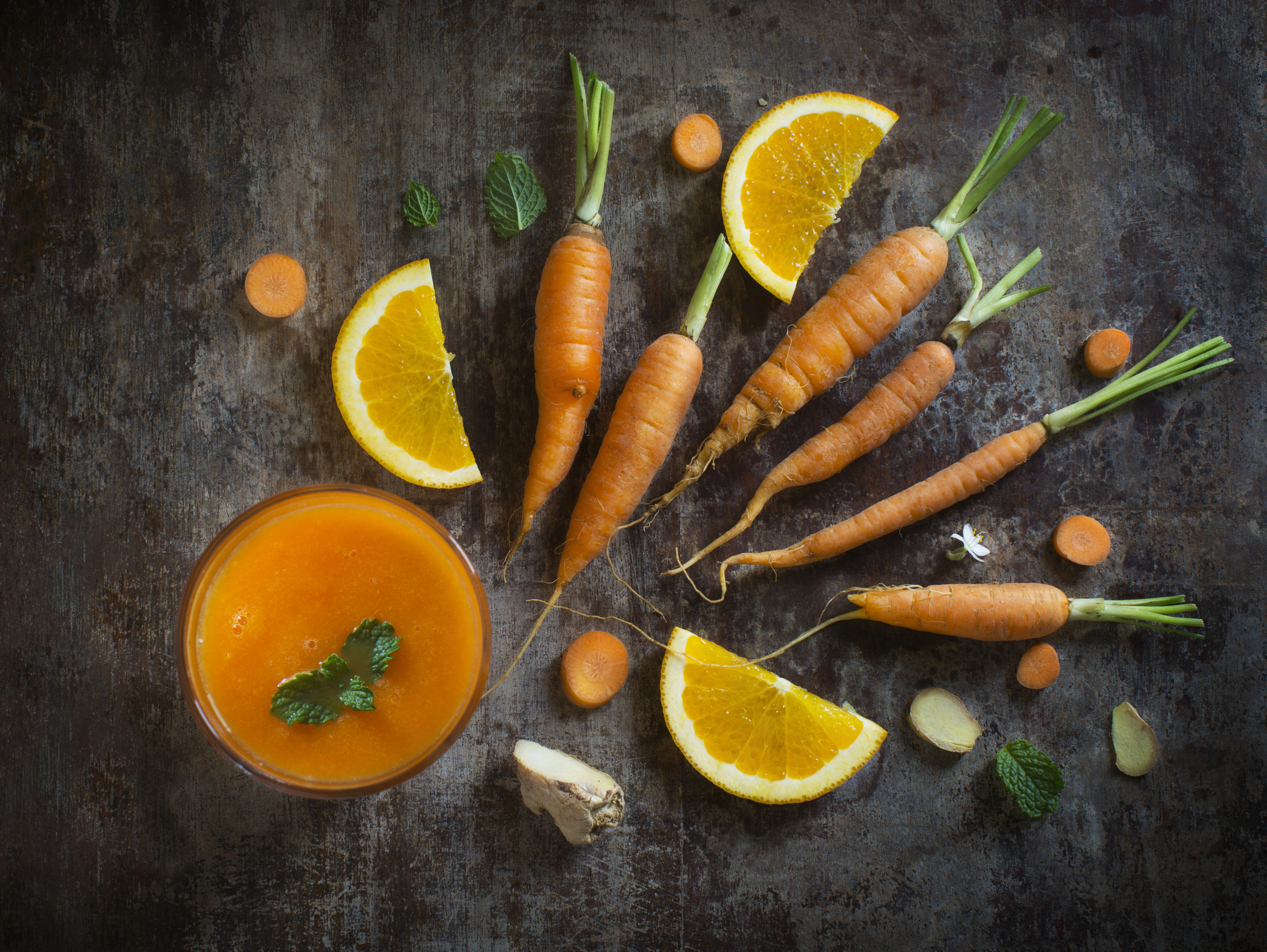 Fresh orange, ginger, and carrot juice