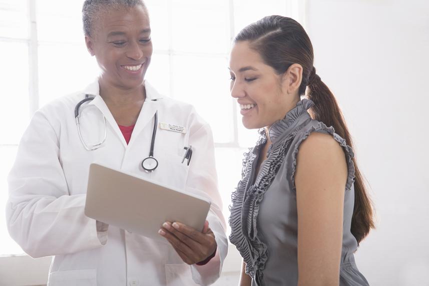 Doctor consulting a patient on her health. 