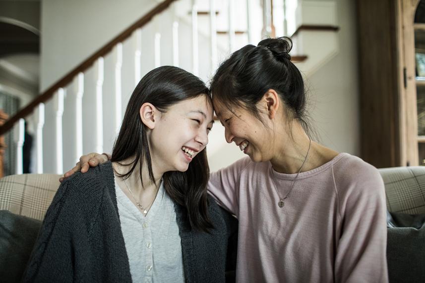 Mother smiling with her daughter