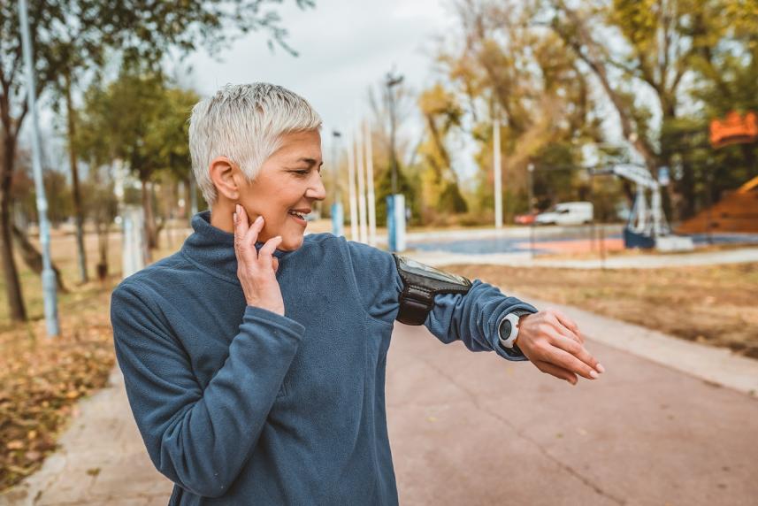 Woman measuring pulse