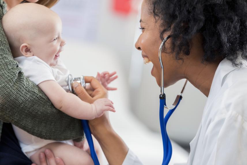 doctor laughing baby