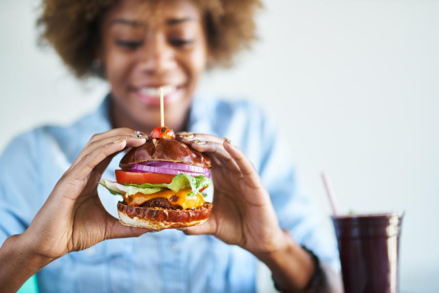 woman eating a burger