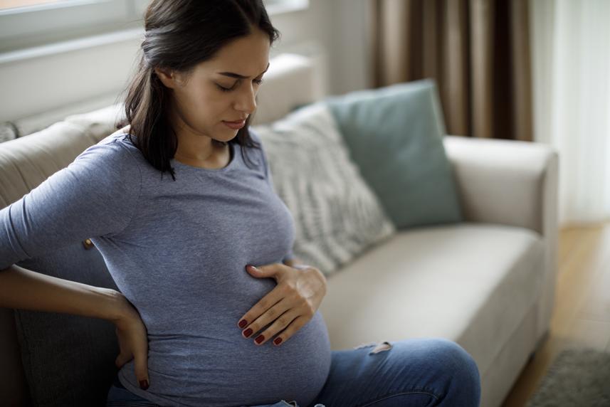 Pregnant woman on sofa