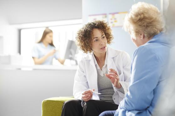 Senior woman talking to her doctor