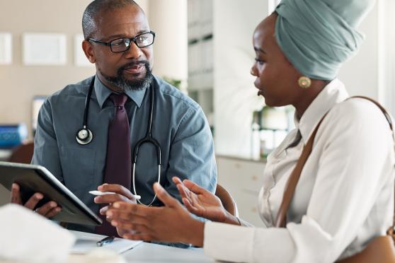 woman talking to her doctor