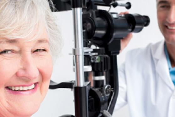 elder woman doing eye exam