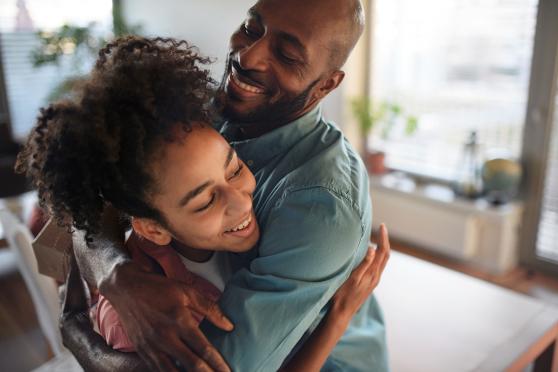 Father and daughter hugging