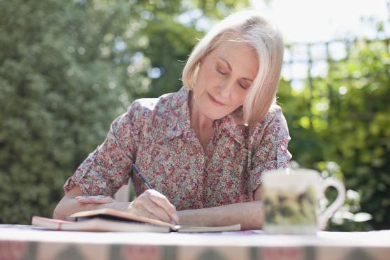 Person writing in a journal