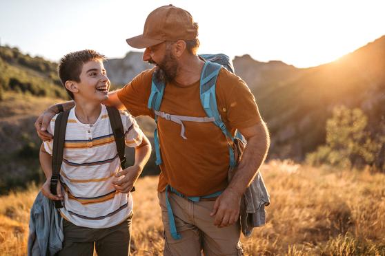 Father and son hiking together