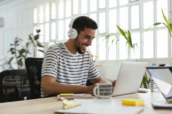 Man at work sitting ergonomically