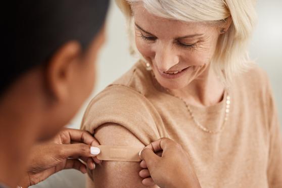 Person getting a vaccine shot