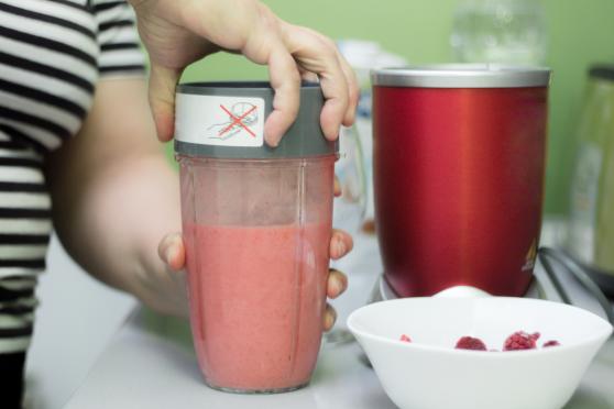 Woman making smoothie