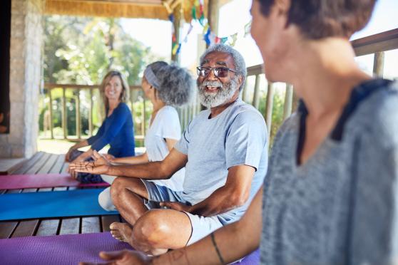 older people doing yoga