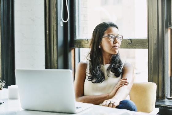 woman working next to window