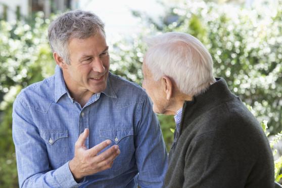 Older men talking to each other