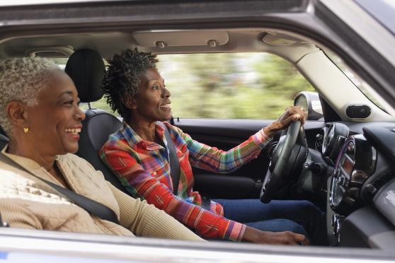 Two women driving in a car