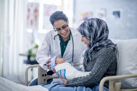 Woman and baby with doctor