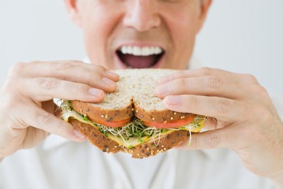 man eating a sandwich